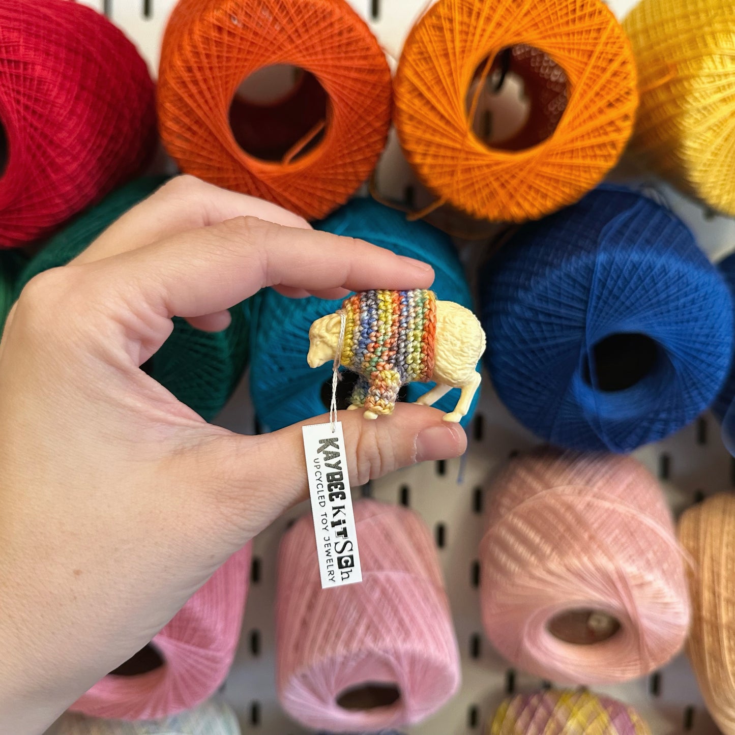 Sheep “Sweater Friend” Figurine - Orange/yellow/blue/green sweater