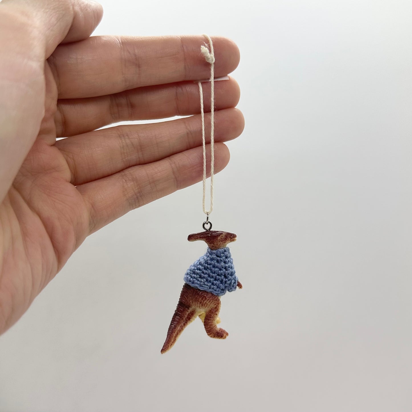 Dinosaur "Sweater Friend" Ornament - horn-head with blue sweater